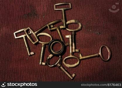 A group of old gold keys closeup