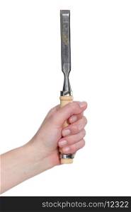 A hand holding a chisel.