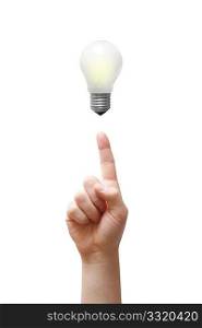 A hand holding a light bulb