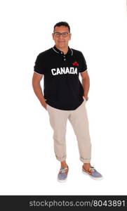 A handsome Hispanic man standing in a shirt with Canada on standingisolated for white background.