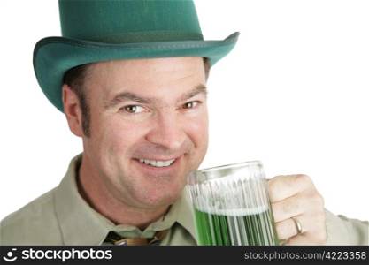 A handsome Irish American man with green beer on St. Patrick&rsquo;s Day. White background.