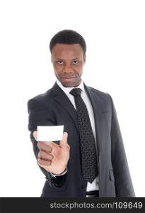 A handsome young African American businessman holding an emptybusinesscard, in suit and tie, isolated for white background