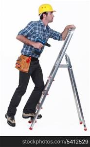 A handyman climbing a ladder.