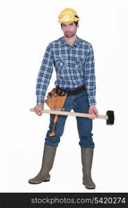 A handyman with a sledgehammer.