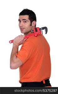 A handyman with a wrench.