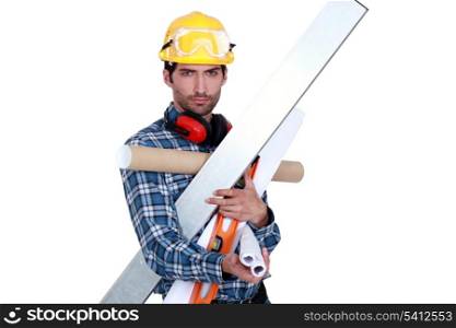 A handyman with his arms full.