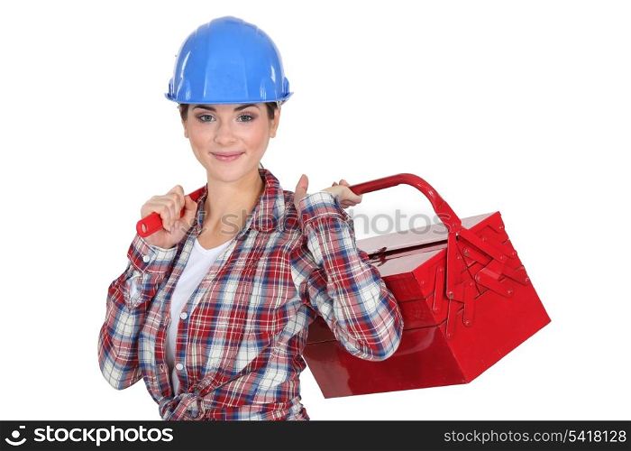 A handywoman holding a toolbox.