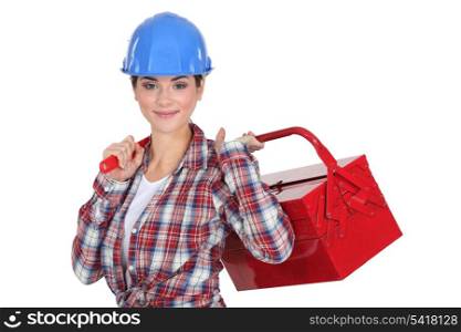 A handywoman holding a toolbox.