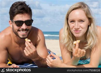 a happy couple - beach food friendship summer