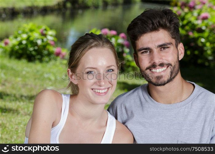 a happy couple in the park