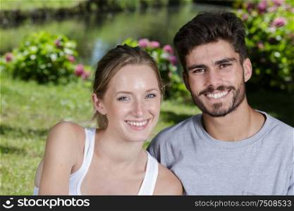 a happy couple in the park