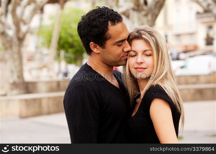 A happy european couple in an urban setting