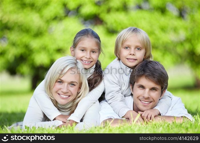 A happy family with children outdoors