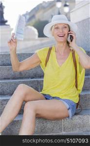 a happy female using smartphone
