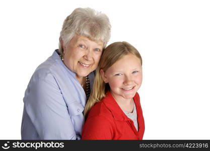 A happy grandmother and granddaughter together. Isolated on white.