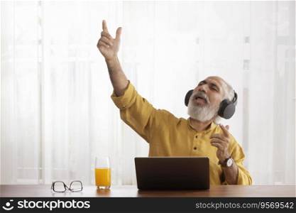 A HAPPY OLD MAN CHEERFULLY SINGING WHILE LISTENING TO MUSIC 
