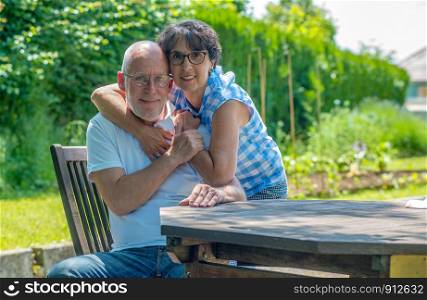 a happy senior couple in the garden