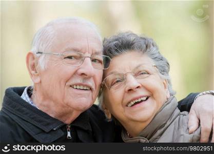 a happy senior couple outdoors