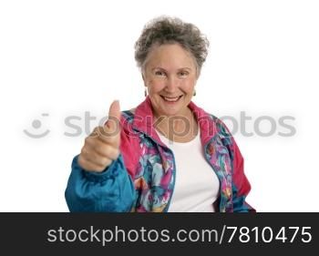 A happy senior woman in a track suit giving a thumbsup sign. Isolated on white.