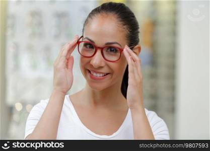 a happy woman in glasses