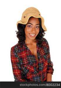 A happy young African American woman is a portrait image with astraw hat on her black curly hair, isolated for white background.