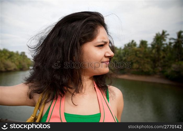 A happy young girl enjoying nature