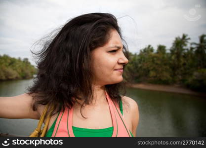 A happy young girl enjoying nature