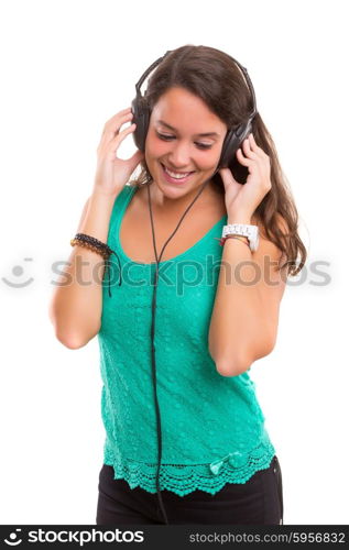 A Happy young woman listening to music