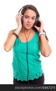 A Happy young woman listening to music