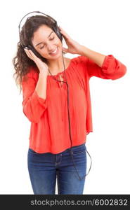 A Happy young woman listening to music