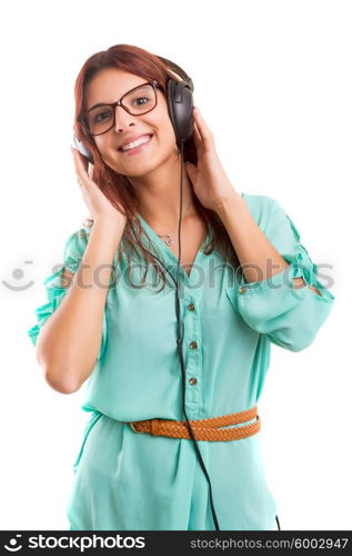 A Happy young woman listening to music