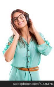 A Happy young woman listening to music