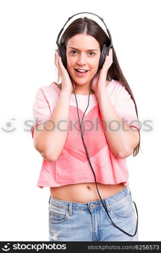 A Happy young woman listening to music