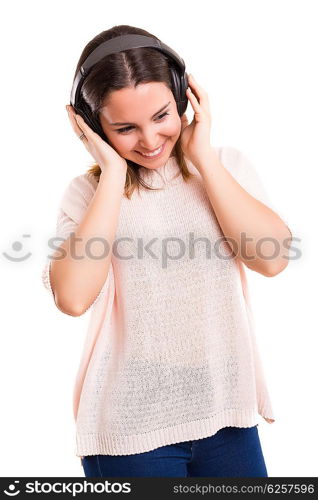 A Happy young woman listening to music