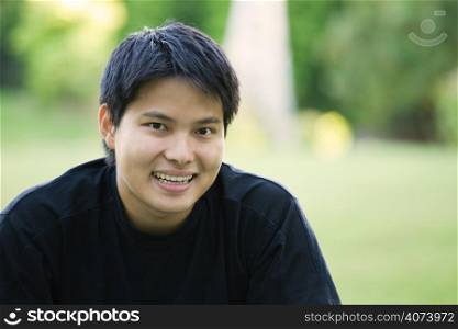 A headshot of an asian college student