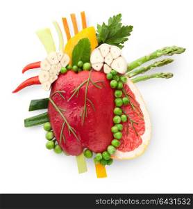A healthy human heart made of fruits and vegetables as a food concept of smart eating.