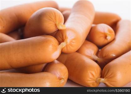 A heap of raw Vienna sausages close up