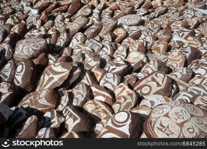 A heap of stones in buddhist monastery in Tibet, China