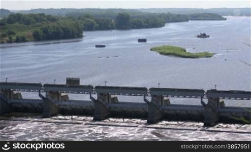 A high angle view of the Illinois River and the Starved Rock Lock and Dam. Includes a wide shot and a close-up.