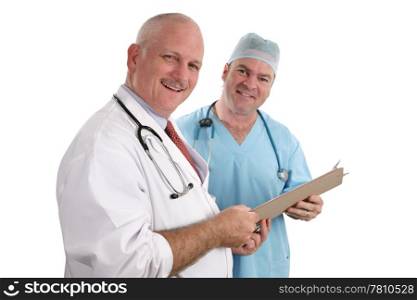 A horizontal view of two handsome, smiling doctors holding a patient&rsquo;s chart. Isolated. (focus on doctor in foreground)