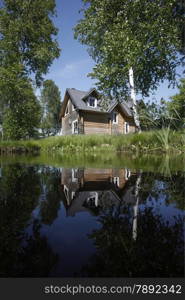 a House on a smal lake near the city of Vilnius and the Baltic State of Lithuania,