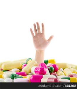 A huge pile of various pills with a man&rsquo;s hand coming out representing drug abuse, addiction, chronic pain, medication confusion, and medical guidance help.