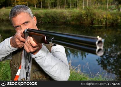 a hunter aiming for a target