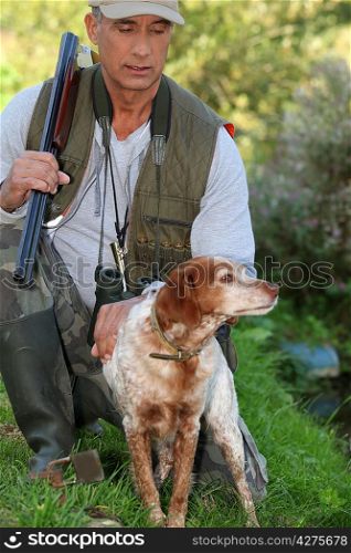 a hunter and his dog