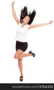 A joyous young female business executive celebrating success with raised hands on white