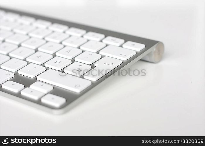A keyboard with focus on the Enter key