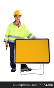 A kid road worker.