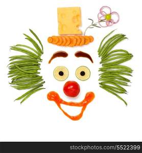A kind clown made of vegetables and cheese.