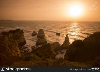 a landscape at the rocks of Ponta da Piedade near Lagos and Luz at the Algarve of Portugal in Europe.. PORTUGAL ALGARVE LAGOS PONTA DA PIEDADE