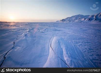 A landscape on the island of Spitsbergen, Svalbard, Norway late at night. View from Longyearbyen.
